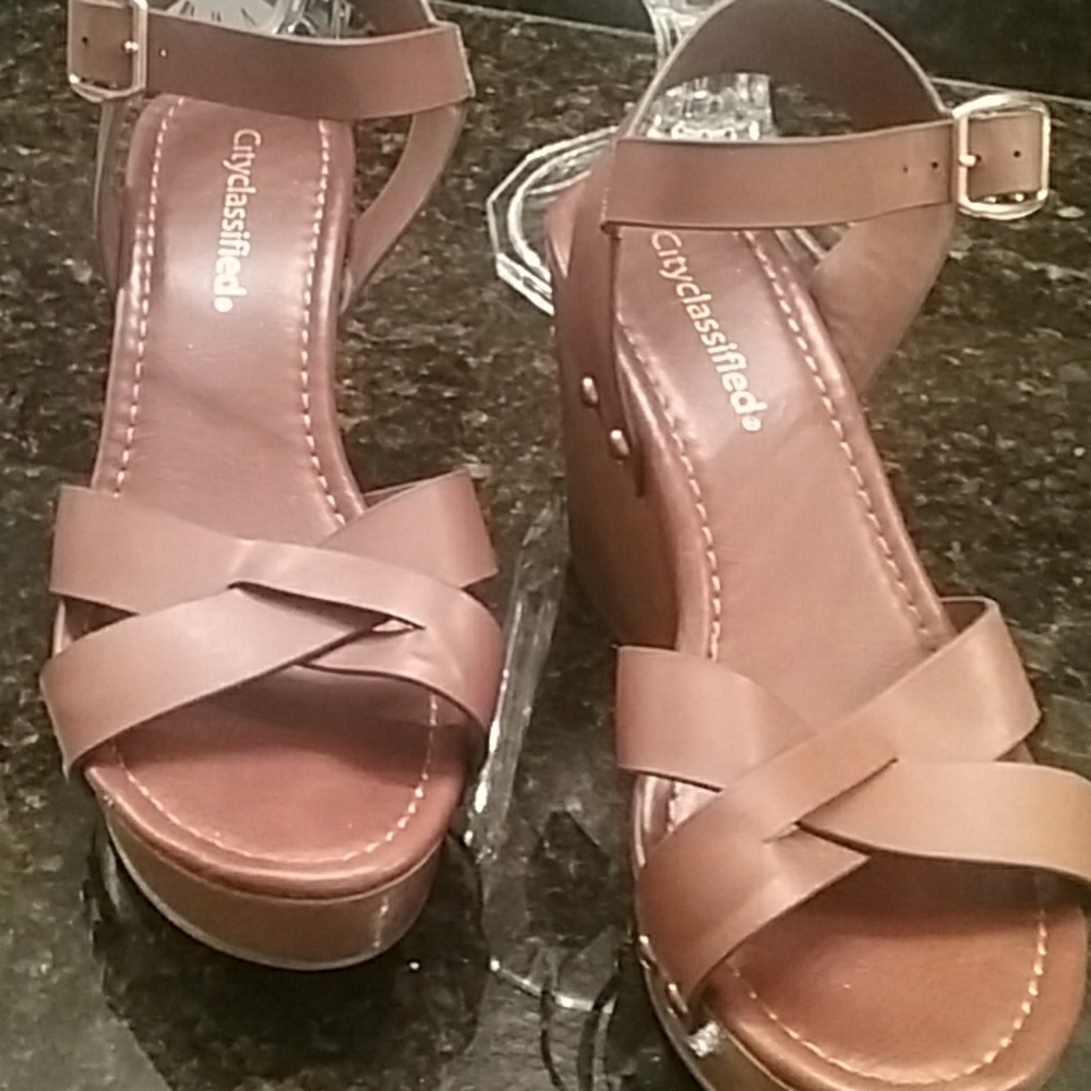 Wedge sandals with 3 & 3/4 heel.